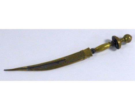 UNUSUAL MIDDLE EASTERN DAGGER, the brass hilt sheath having saw tooth line and other decoration, the curved steel blade and b