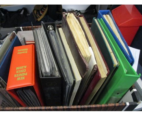 Stamps of the world in ten stock books and First Day covers in four albums