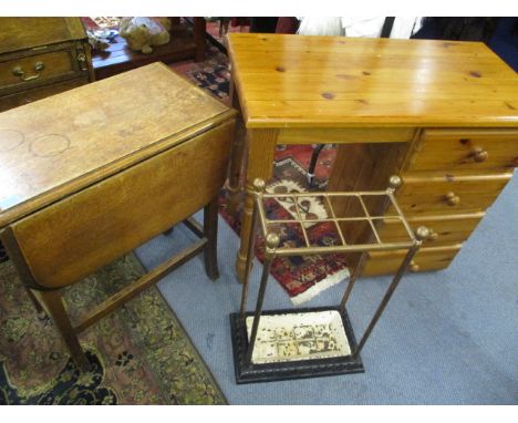 A modern pine desk with four short drawers, a small oak drop leaf table and a Victorian umbrella/stick stand with wrought iro