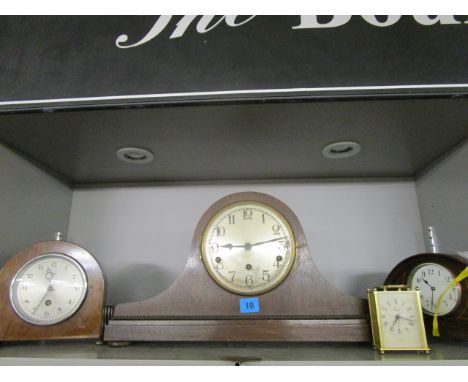 A group of Edwardian and later mantle clocks to include an Edwardian inlaid mahogany clock with ormolu open columns, a Napole