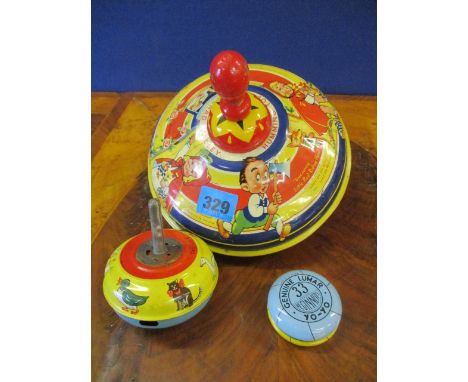 A Chad Valley Humming top, together with a Triang spinner and a genuine Lumar yo-yo