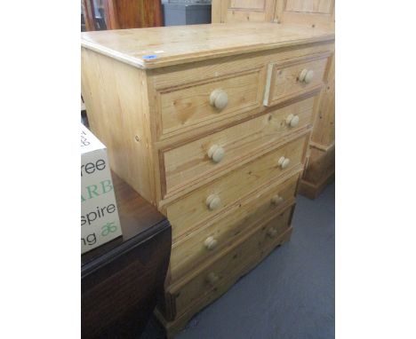A modern pine chest of six drawers, raised on a bracket plinth, 46 h, 36 w