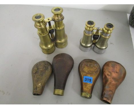 A group of four 19th century brass, copper and leather powder flasks, along with a Dolland of London, and a A Franks, Manches