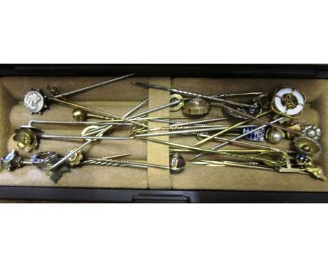 A collection of Victorian and later 9ct gold, yellow metal and white metal stick pins