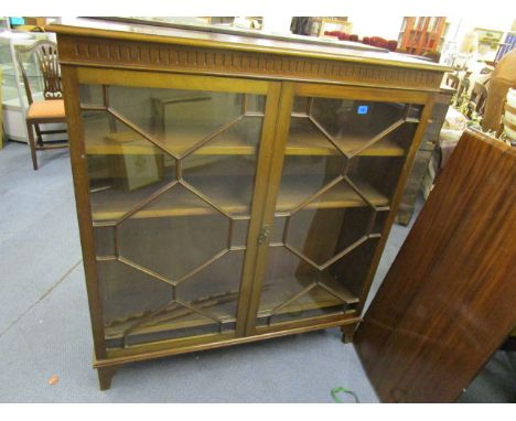 Two Edwardian mahogany bookcases, each with astragal glazed doors on bracket feet, 49 5/8h x 45 1/4w x 13d