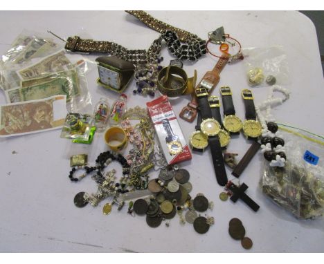 A mixed lot of coins and banknotes, costume jewellery, enamel badges, wristwatches and other items