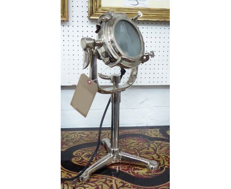 TABLE SPOT LIGHT, in chromed metal on a triform base, 43cm H. 