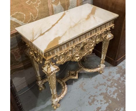 PAIR OF CONSOLE TABLES, Italianate manner, with ornate gilt highlighted supports, differing marble tops, each 94cm W x 46cm D
