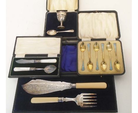 SET SILVER GILT AND ENAMEL SPOONS, set of fish servers, christening silver egg cup and spoon, mother of pearl handled spoon a