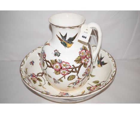 An S. Fielding & Co., 'Spring' pattern wash jug wand basin with floral, butterfly and bird decoration.