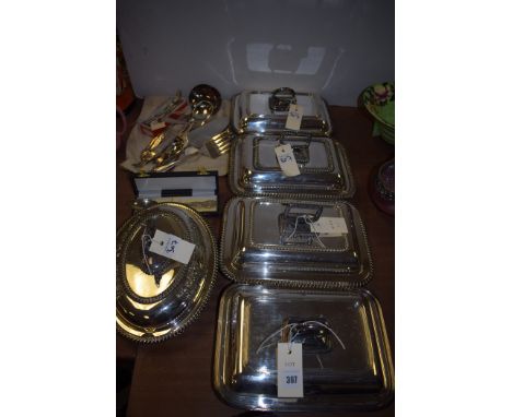 Silver-plated tureens and other metalware, to include: soup spoons; cake slice; ladle; and others.