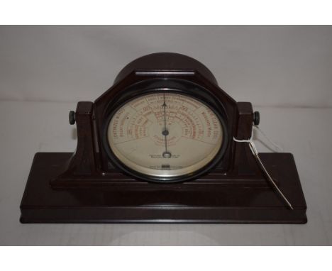 A Short & Mason Stormoguide aneroid barometer, inscribed 'Northern Goldsmiths Co., Newcastle upon Tyne', in brown bakelite ca