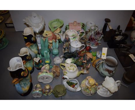 Four graduated Royal Winton fish-shaped jugs; Royal Albert Beatrix Potter figures of Jeremy Fisher; Sylvac rabbits; Royal Wor