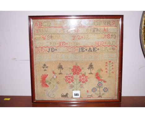 A 19th Century sampler depicting the alphabet and garden scene, worked by Catherine Dickenson, aged 9.