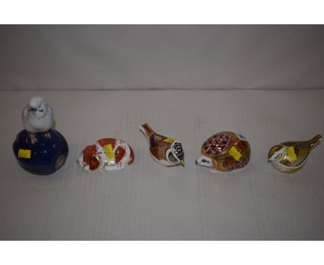 Royal Crown Derby paperweights, to include: 'Orchard Hedgehog'; 'Puppy'; 'Crested Tit'; 'Fire Crest', all with gold stoppers;