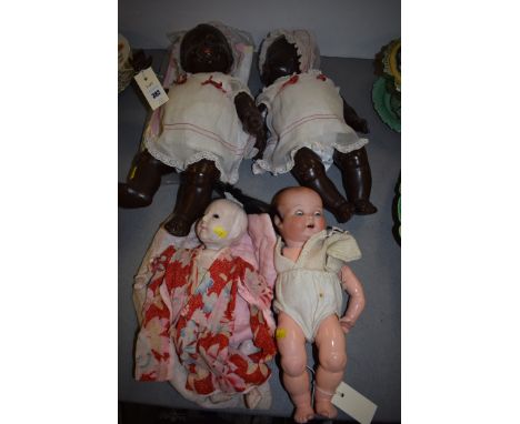 An Armand Marseille composite doll, no. 51/3.k stamped to neck, with sleeping eyes and open mouth; a Japanese doll wearing a 