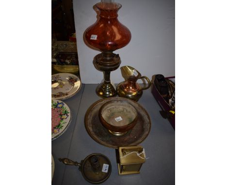 A Victorian black brass oil lamp with orange coloured glass shade; a copper and brass jug; a Metamec brass carriage clock; an