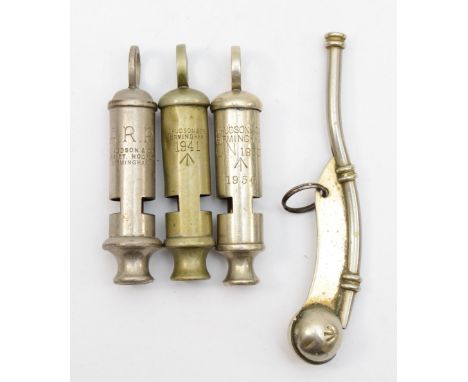 A British Military nickel bosuns whistle, broad arrow, and three Hudson Military whistles, ARP, 1941 and broad arrow, CN 1980