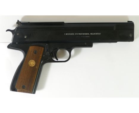 A German Weihrauch HW45 .177 air pistol, serial number 350073 with hard carry case and opened tin of pellets. This product is