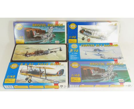 Smér, four vintage plastic 1:48 kits of aviation models, 0806, two 0812, 0811, together with two 1:72 models, 165 and 0866. 