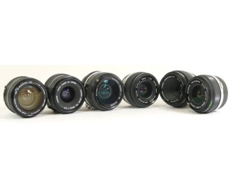 Six various camera lenses comprising of two OM-System Zuiko Auto-W 28mm 1:2.8, Nikkor-S Auto 1:1.4 f=50mm, Nikkor 1:2.8 24mm,