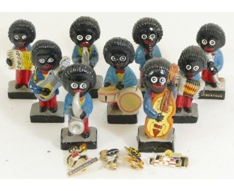 A collection of mid 20th century Robertson "golly band"  figures, with four pin badges.These items are listed on the basis th