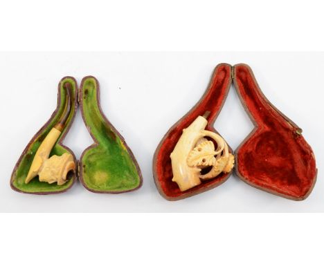 A carved Meerschaum pipe in the form of a bunch of grapes, lacking mouthpiece, case and another depicting a lady 