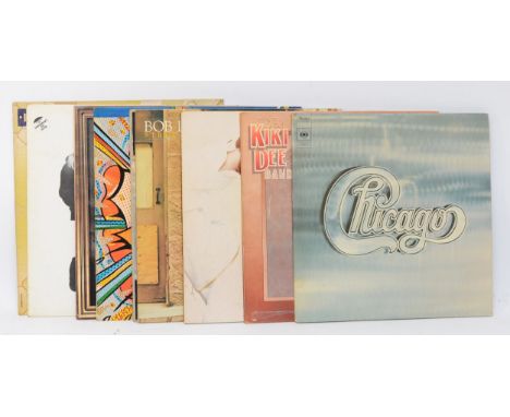 A collection of ten vinyl LPs to include artists such as Ian Drury, Bob Dylan &amp; Kiki Dee (10) 