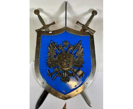 A decorative wall hanging sword and shield, 88 x 62cm.This bladed product is not for sale to people under the age of 18. By b