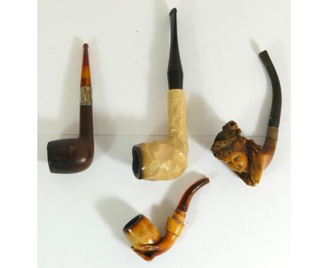 A carved Meerschaum pipe of a 19th century lady, an Oppenheimer City de Luxe pipe, boxed with paperwork and two other pipes 