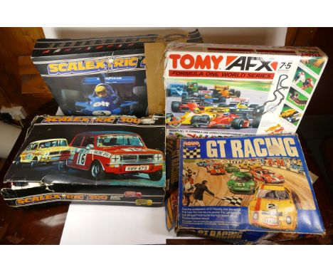 Vintage electric racing games comprising, two Scalextric sets, 300, 400, Novo GT Racing, Tomy AFX Formula One World Series. 