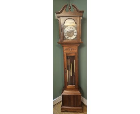 A 20th century clock three weight longcase clock, with broken swan neck pediment, the brass dial with sun/moon subsidiary dia