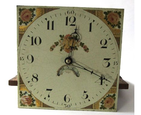 Longcase clock dial with movement, the painted dial with the spandrels painted as roses with floral spray to centre  