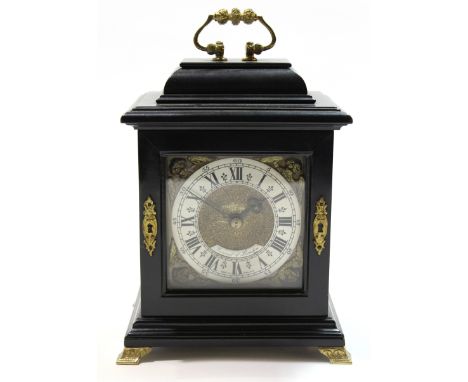 Small 18th century style bracket clock, by Baronet of London, the clock in black ebonised case, the two sides with gilt fretw