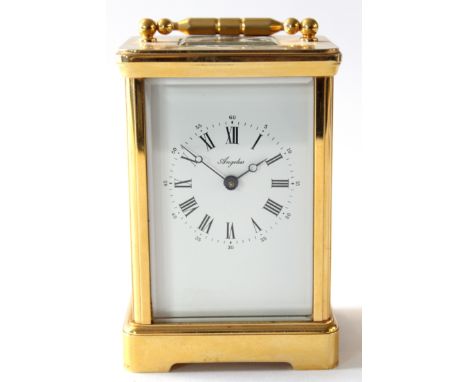 Brass carriage clock, the white Roman enamel dial inscribed Angelus with a Swiss made movement, 13cm high