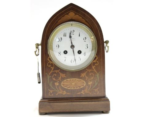 Edwardian bracket clock by S Money of Lowestoft, the clock in lancet style case with brass handles with white enamel dial, to