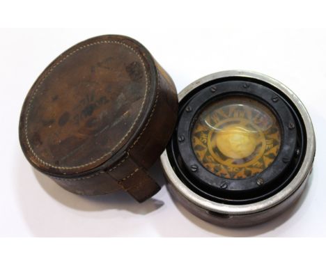 Small ship's compass in leather case, 9cm diam
