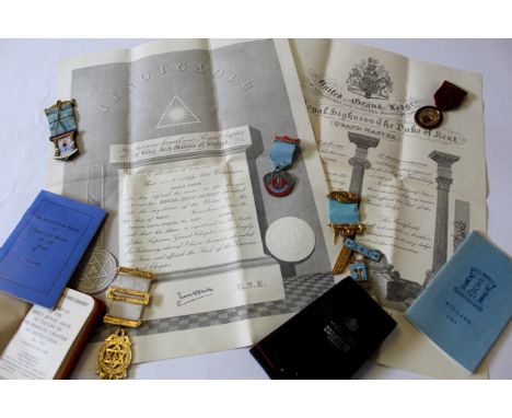 Small box containing Masonic ephemera including membership certificates and copy of by-laws together with five gilt enamel ba