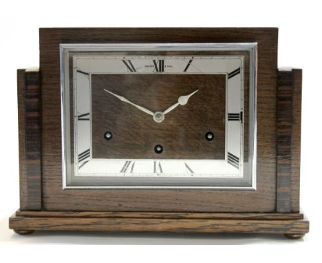 Art Deco style mantel clock in stepped wooden case, by Walker &amp; Hall, retailed by Garrard, 30cm long