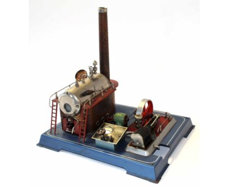 Model of a steam engine, by Wilesco on metal base
