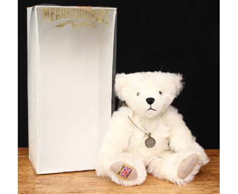 A Merrythought SH12SPC Sixpence teddy bear, trademark yellow square 'MERRYTHOUGHT MADE IN ENGLAND' label to foot, 28cm high, 