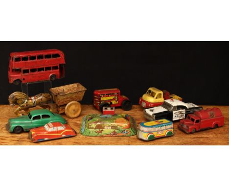 A collection of 20th century tinplate and plastic toys, comprising a Tri-ang Minic tinplate and clockwork London Transport do