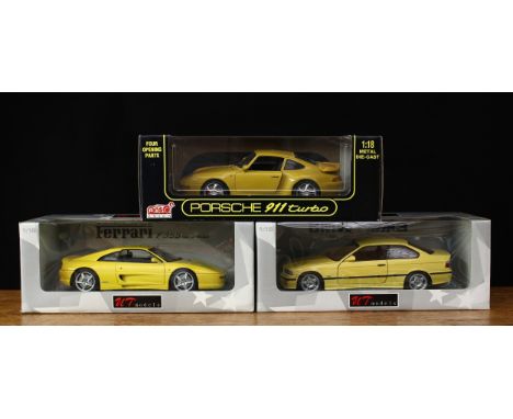 UT Models 1:18 scale 180 022300 BMW M3 Coupe 1996 yellow window boxed; UT Models 1:18 scale 180 074021 Ferrari F 355 coupe 19