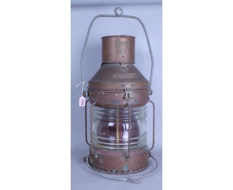 A LARGE EARLY 20TH CENTURY BRASS SHIPS LANTERN26cm wide; 63cm highCLIENT ASKED TO DONATE TO GUTS CHARITY ON 8/11/21 C/O LEE C