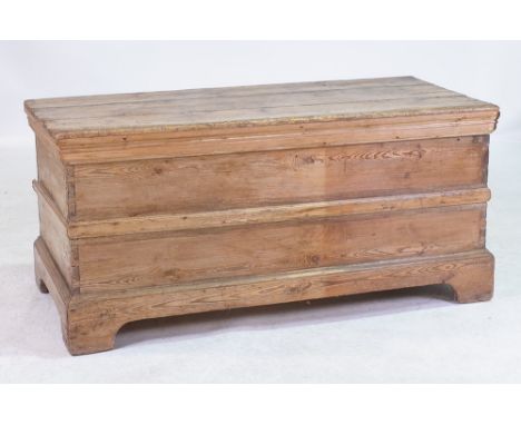 A LATE VICTORIAN PINE TRUNK131cm wide; 61cm highSome parts are not original with the panelled frieze being later added, inter