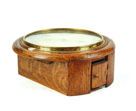 AN OAK MOUNTED WALL CLOCKMid-20th CenturyWith enamel dial and Roman hours, single train fusee movement, 39cm diameterConditio