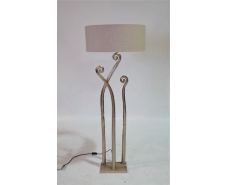 AN UNUSUAL MODERN FLOOR STANDING LAMP  OF STYLISED NATURALISTIC FORM131cmNo stains or marks to the body of the lamp, the top 