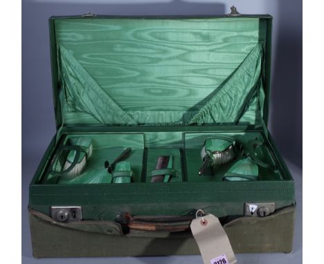 AN EARLY 20TH SILVER MOUNTED AND GREEN ENAMEL VANITY CASE55cm wide; 18cm highOld marks and scratches to all the items in the 