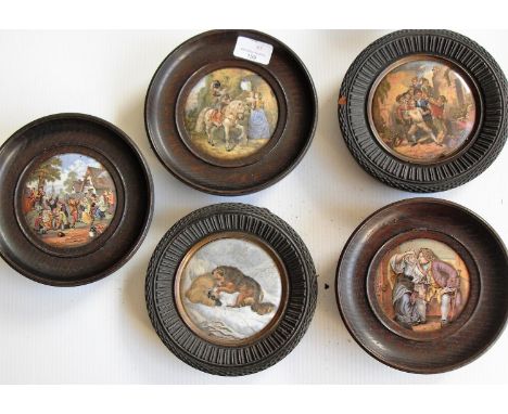 A selection of five wood-framed Prattware pot lids: 'The Village Wedding', 'The Snow Drift', 'Uncle Toby', 'The Snow Leopard'