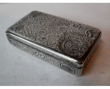 A 19th century Russian silver snuff box with c-scroll and floral etched niello decoration, stamped for St. Petersburg 1848 A.